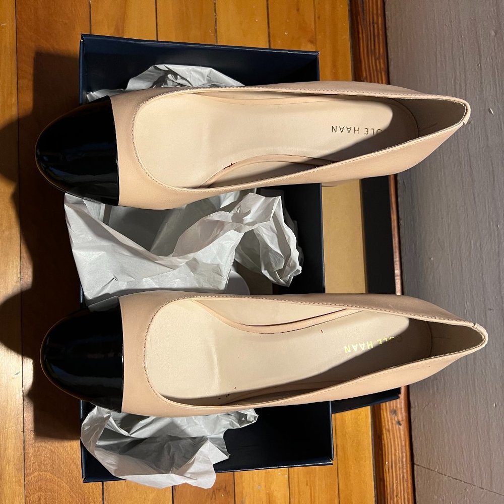 Never been worn Cole Haan Classic tan leather pump with black patent toe cap, 9B